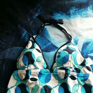 White, black, and blue swim top. Used only twice.